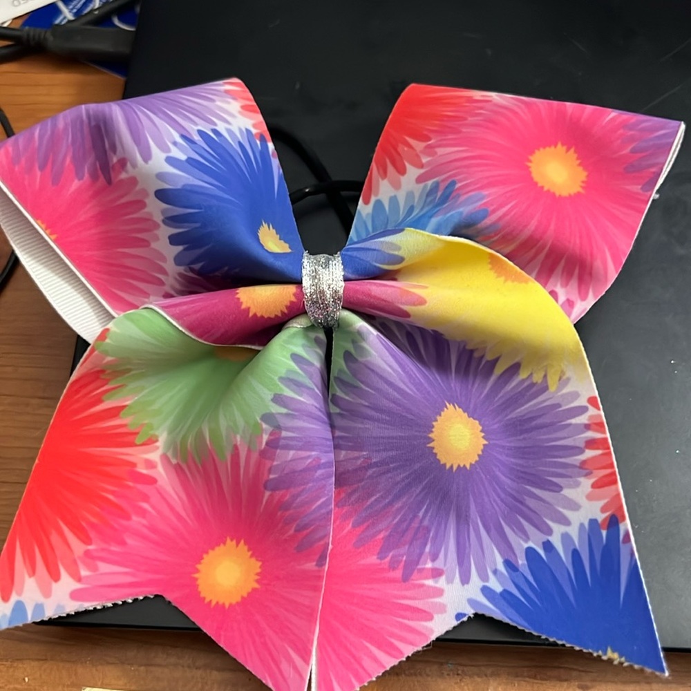 Flower print cheer bow.